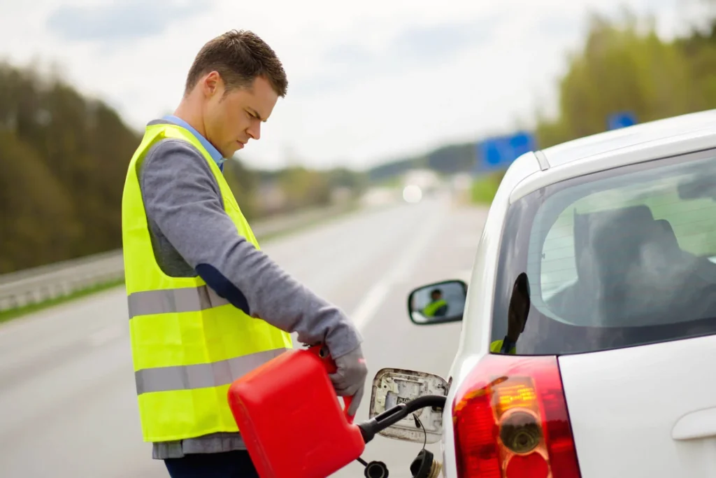 Fuel Delivery - a man filling up a gas tank